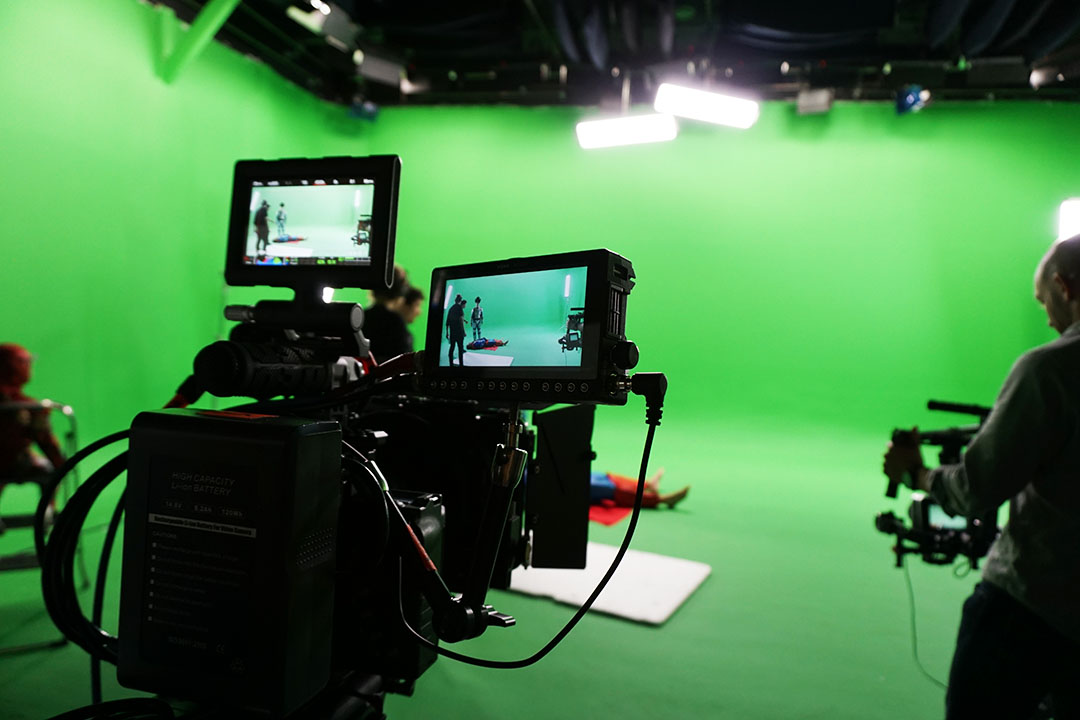 caméra et fond vert pour tournage vidéo